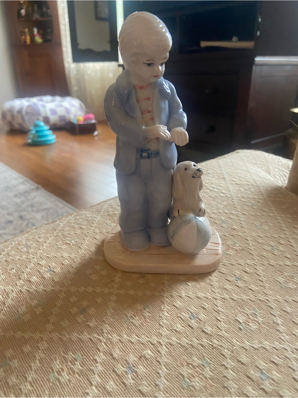 Porcelain Boy Figurine with dog  on Ball - Pale Blue and Cream
